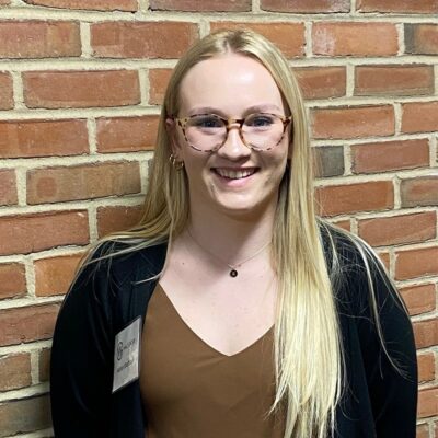 Professional headshot of Kaitlyn