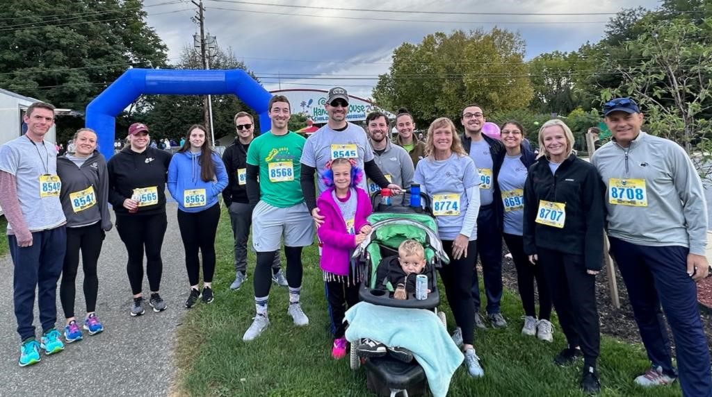 Team Walz Group Team and local area runners after a Hands-on House 5K Race